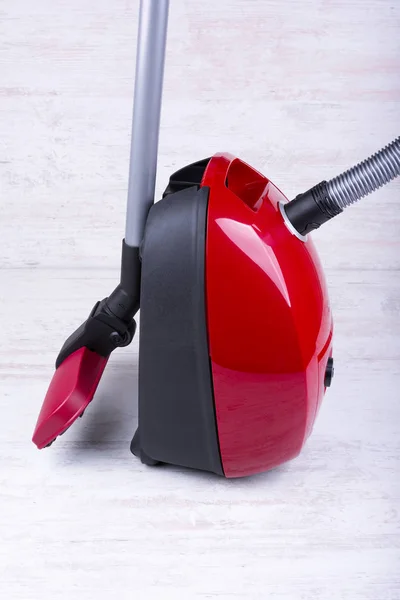 Red Vacuum Cleaner White Wooden Background — Stock Photo, Image