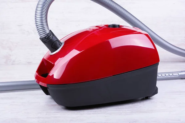 Red Vacuum Cleaner White Wooden Background — Stock Photo, Image