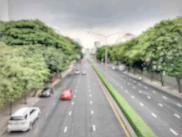 Résumé circulaire bokeh motion lens flou arrière-tour de la ville et le réverbère ou la lumière Bokeh de la voiture dans la rue dans la nuit. Bangkok Expressway Thaïlande . — Photo