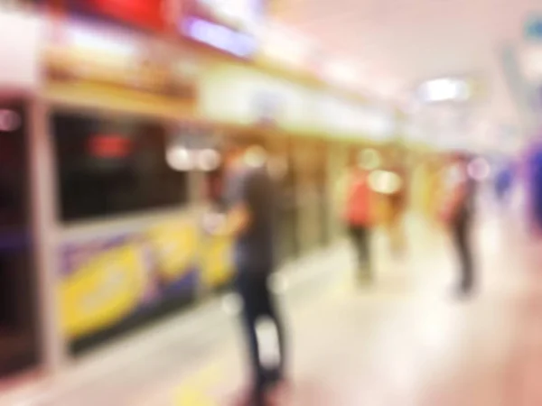 Blurred people in railway station. Travel concept