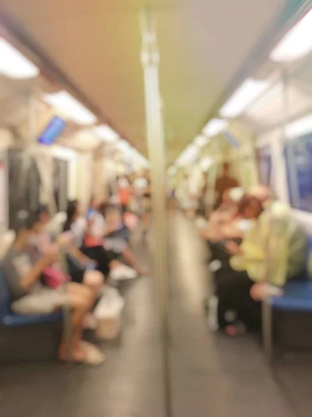 Blurred people in train. Subway travel concept