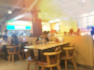 Fast food kavramı. İnsanlar yeme blurred. Vintage rengi.