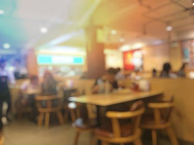 Fast food kavramı. İnsanlar yeme blurred. Vintage rengi.