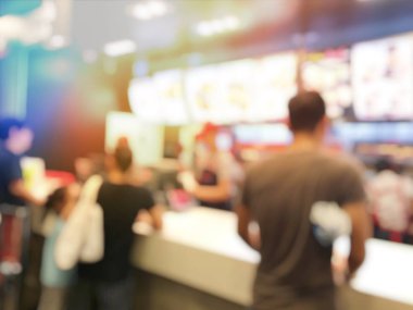 Fast food kavramı. İnsanlar yeme blurred. Vintage rengi.