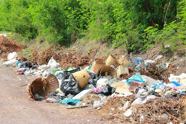 Mountain garbage, large and degraded garbage pile, Pile of stink and toxic residue, waste plastic bottles and other types of plastic waste site in trash dump or landfill. Pollution concept.