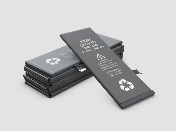 Şarj edilebilir cep telefonu pilleri. Gri arkaplanda izole.