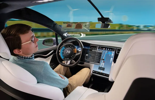 A man sleeps while his car is driven by an autopilot. Self driving vehicle concept