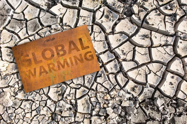 Rusty sign with text "Global warming" — Stock Photo, Image