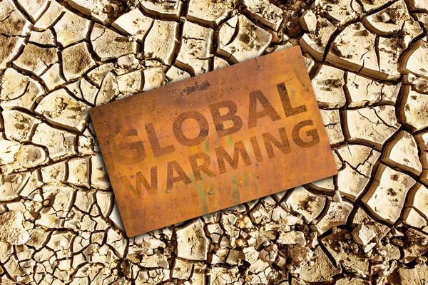 Rusty cedulka s textem "globální oteplování" — Stock fotografie