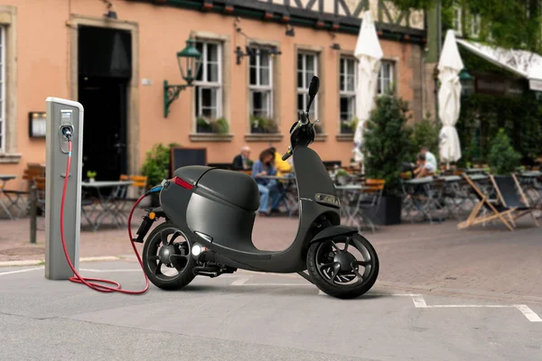 Bir Şehir Caddesinde Şarj Istasyonu Ile Paylaşmak Için Elektrikli Scooter — Stok fotoğraf