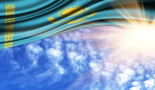 the flag of Kazakhstan in the rays sun