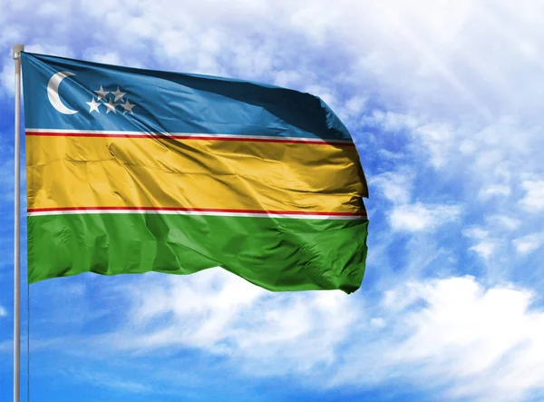 National flag of Karakalpakstan on a flagpole — Stock Image National flag of Karakalpakstan on a flagpole Royalty Free Stock Images