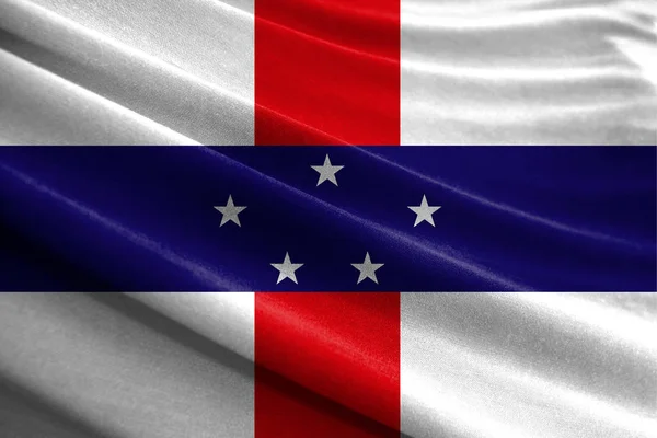 Realistic flag of Netherlands Antilles on the wavy surface of fabric