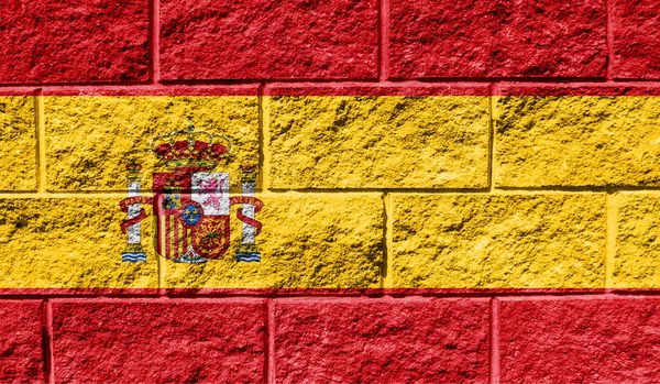Flag of Spain close up painted on a cracked wall