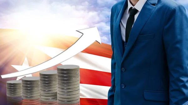 Business concept of increasing sales, Businessman on the background of the flag of Puerto Rico and a graph of increasing up.