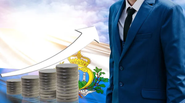 Business concept of increasing sales, Businessman on the background of the flag of San marino and a graph of increasing up.