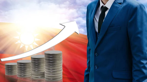 Business concept of increasing sales, Businessman on the background of the flag of Taiwan and a graph of increasing up.