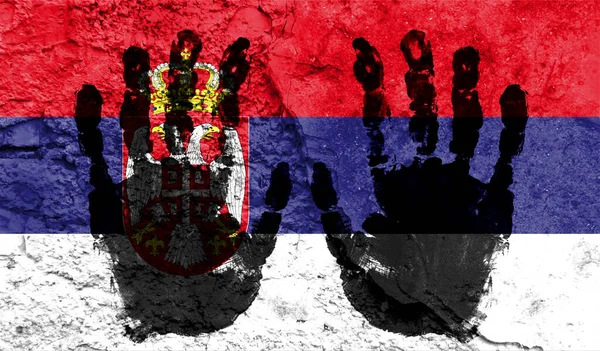 Handprints on the background of the flag of Serbia. Freedom of choice, corruption, and detention concept