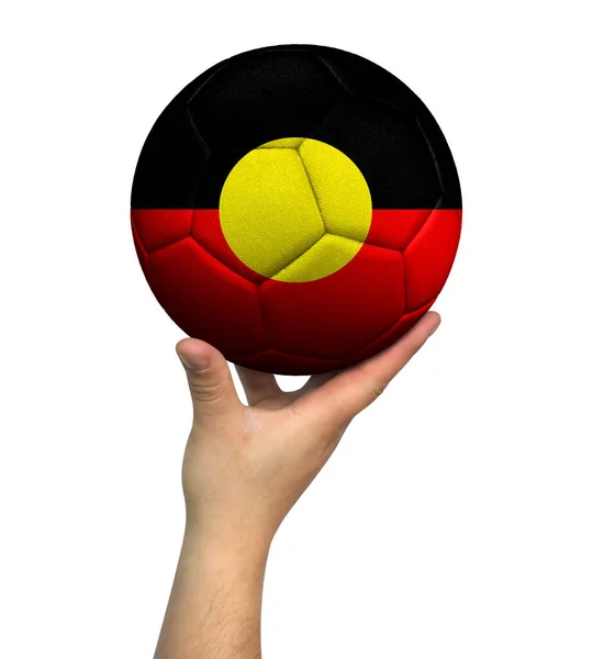 Man holding Soccer ball with Australian Aboriginal flag, isolated on white background.
