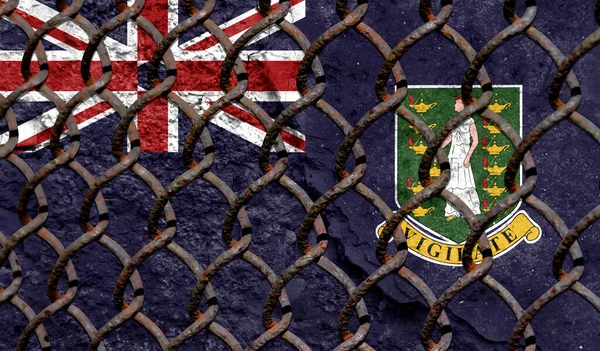 Immigration policy regarding migrants, illegal immigrants and refugees. Steel grid on the background of the flag of British Virgin Islands