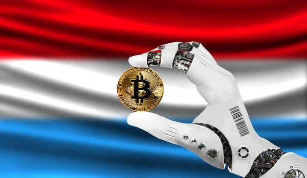 crypto currency bitcoin in the robot\'s hand, the concept of artificial intelligence, background flag of Luxembourg