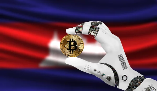 crypto currency bitcoin in the robot\'s hand, the concept of artificial intelligence, background flag of Cambodia