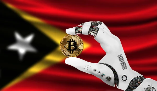 crypto currency bitcoin in the robot\'s hand, the concept of artificial intelligence, background flag of East Timor
