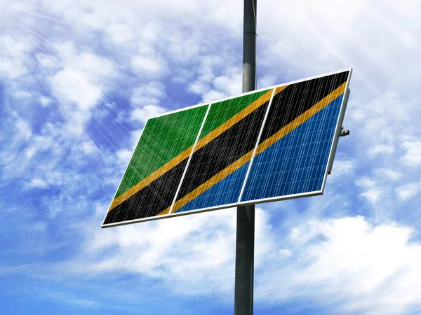 Solar panels against a blue sky with a picture of the flag of Tanzania