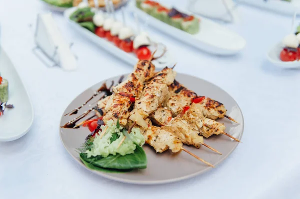 Snacks, fish and meat specialities on the buffet.