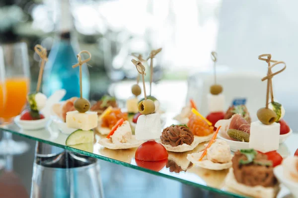 Snacks, fish and meat specialities on the buffet.