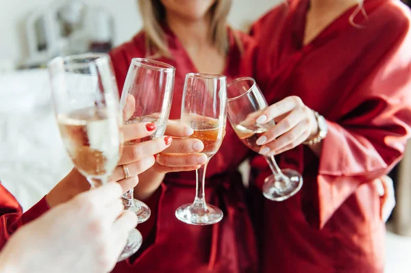 Celebration, eating and holidays concept - hands clinking wine glasses — Stock Photo, Image