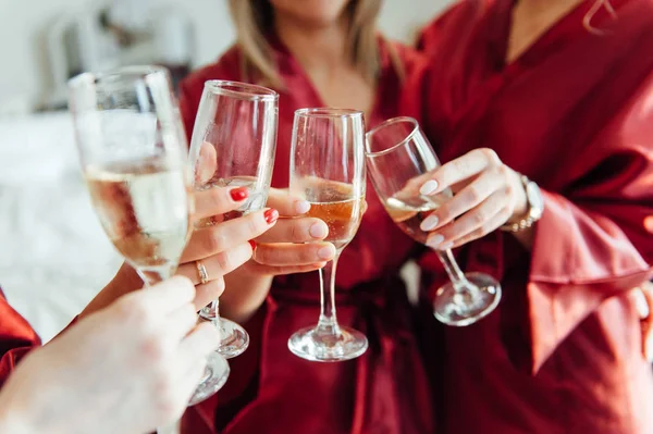 Celebration, eating and holidays concept - hands clinking wine glasses — Stock Photo, Image