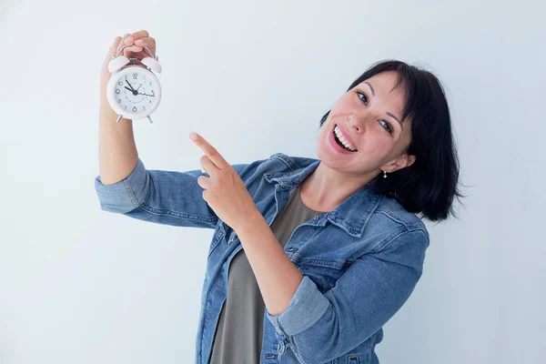 Little blue alarm clock in the hands of woman, the concept of saving time — Stock Photo, Image