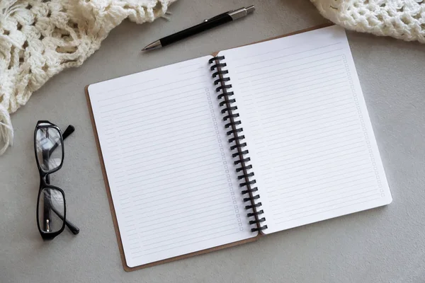 Selective focus table : Businessman hand write notebook, mobile phone, laptop, and pen on the wooden table.working Business concept — Stock Photo, Image