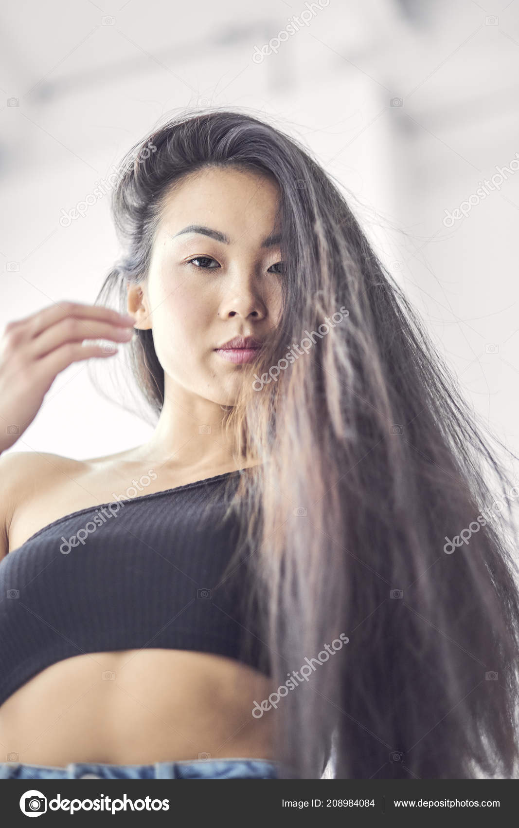 young pretty smiling asian korean girl wearing modern fashion clothers ...