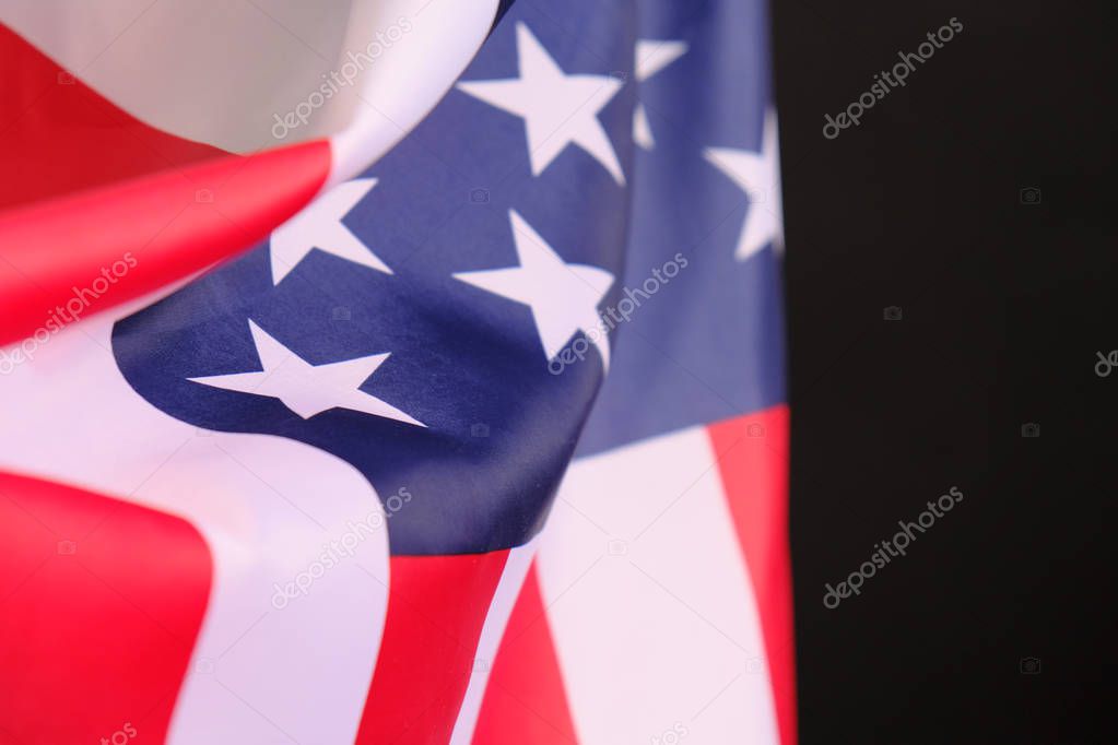 Closeup of American flag on black background