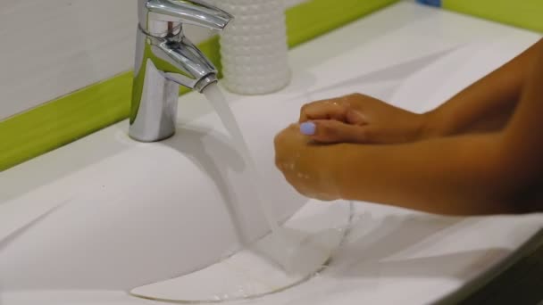 Slow motion. Woman washing her hands with soap in the bathroom — Stock Video