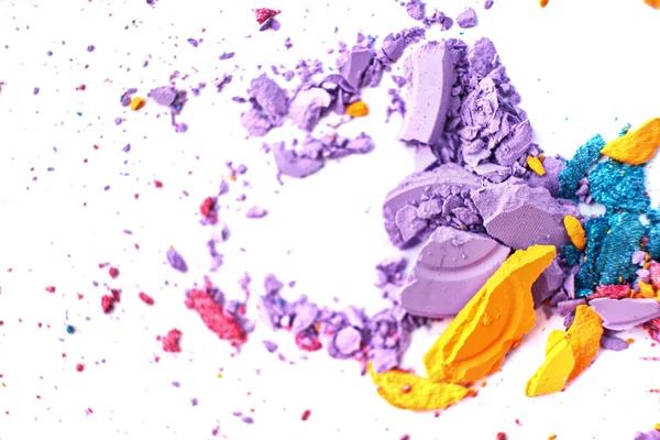 Macro texture Broken eye shadow multi-colored powder, isolated on white background — Stock Photo, Image