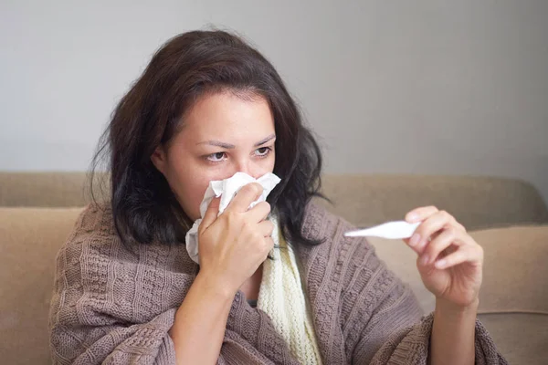 Asian women have high fever and runny nose. sick people concept #375653178  - Larastock