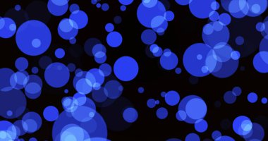 Mavi Şenlikli Noel Arkaplanı. Siyah bir arkaplanda odaklanmış mavi baloncuklar