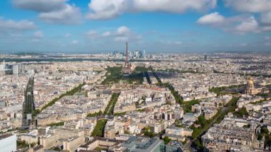 PARIS - MAY 2015: City panorama with the Eiffel tower and clouds 