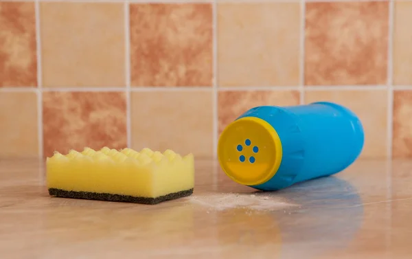 Bright sponge and with dish washing liquid on marble background — Stock Photo, Image