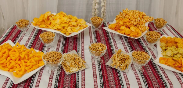 bowl of chips and pistachio - perfect snack for party.