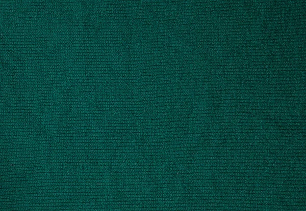 Latar belakang hijau tua dari bahan tekstil. Kain dengan tekstur alami. Latar belakang kain — Stok Foto