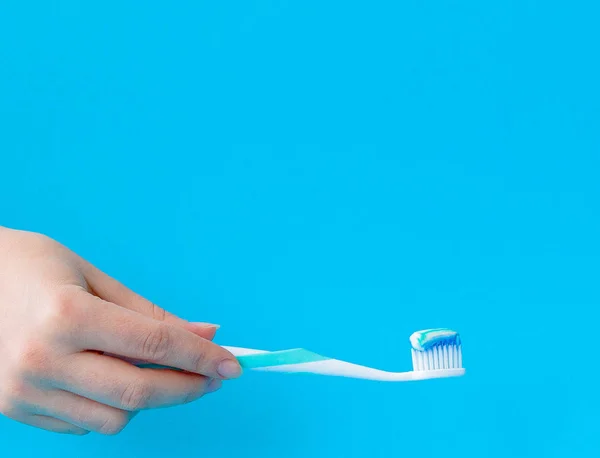Toothpaste Toothbrush Close Blue Light Background — Stock Photo, Image