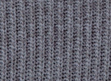 Seamless modeli örgü. Gri Yün arka plan. Eski el yapımı örgü.