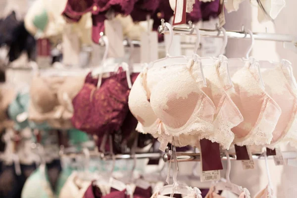 Women's bras for sale in market. Vareity of bra hanging in lingerie  underwear store. Advertise, Sale, Fashion concept Stock Photo by  ©volody100@ukr.net 252785764