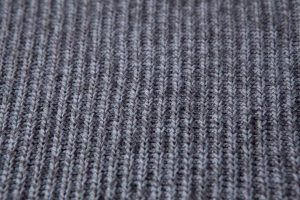 Knitting Seamless Pattern. Grey wool background. Old handmade knit.