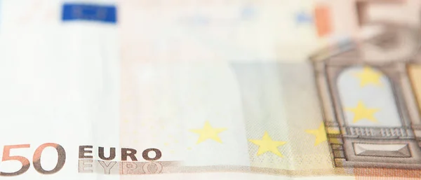 Foto de primer plano de una parte de billete de cincuenta euros incluyendo holograma. Macro foto — Foto de Stock