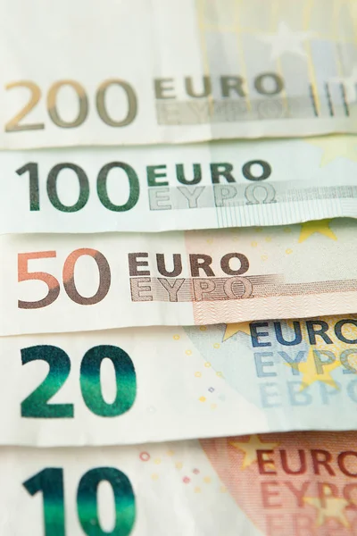 Dinero en euros. Fondo en efectivo en euros. Billetes en euros — Foto de Stock